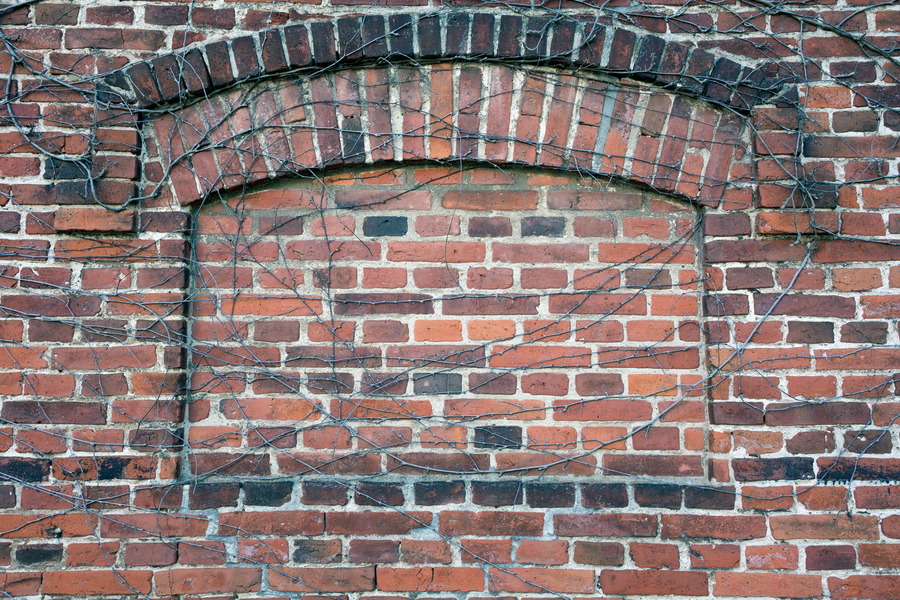 Photo 25289: Red brick wall with portal and indentation