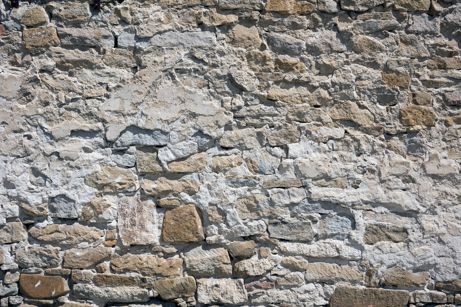 Photo 25466: Decayed, plastered stone wall in white and light brown colours