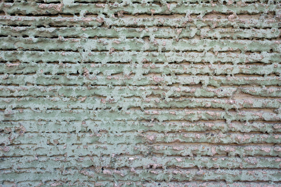 Photo 25532: Worn, plastered wall in light green and light red colours