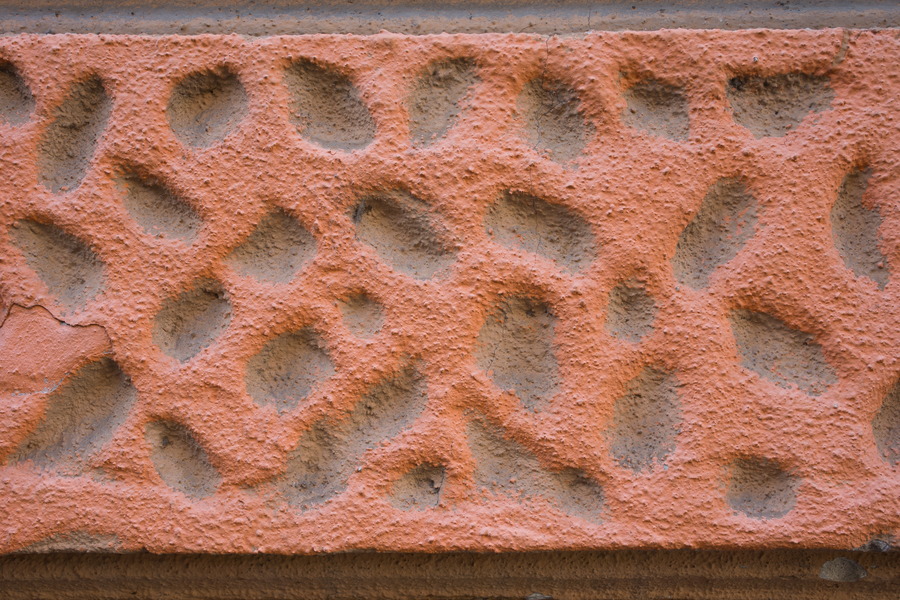 Photo 26086: Detail of orange, plastered wall