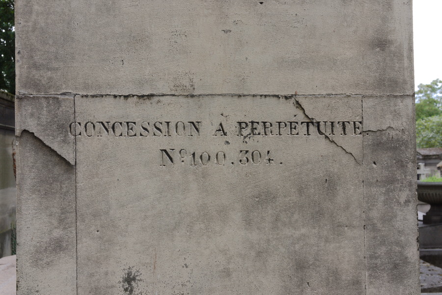 Photo 27403: Grey stone wall with text 