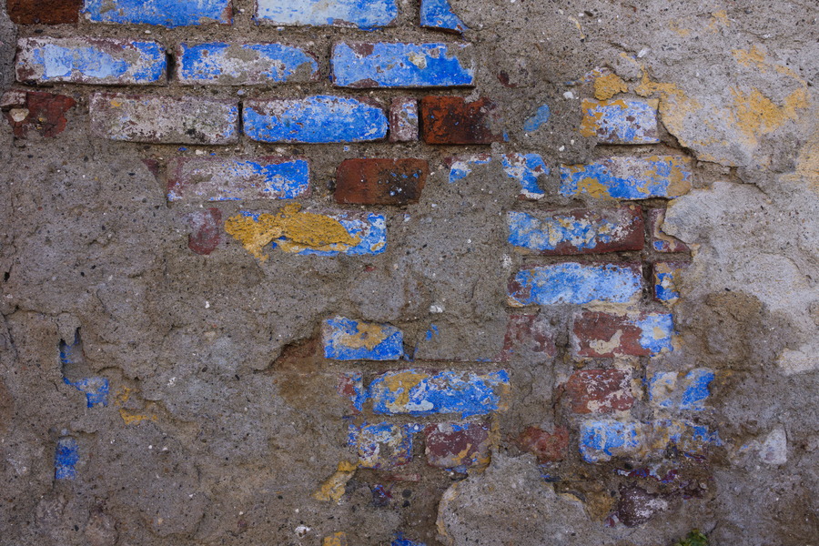 Photo 27417: Decayed, grey, plastered wall with bricks painted blue