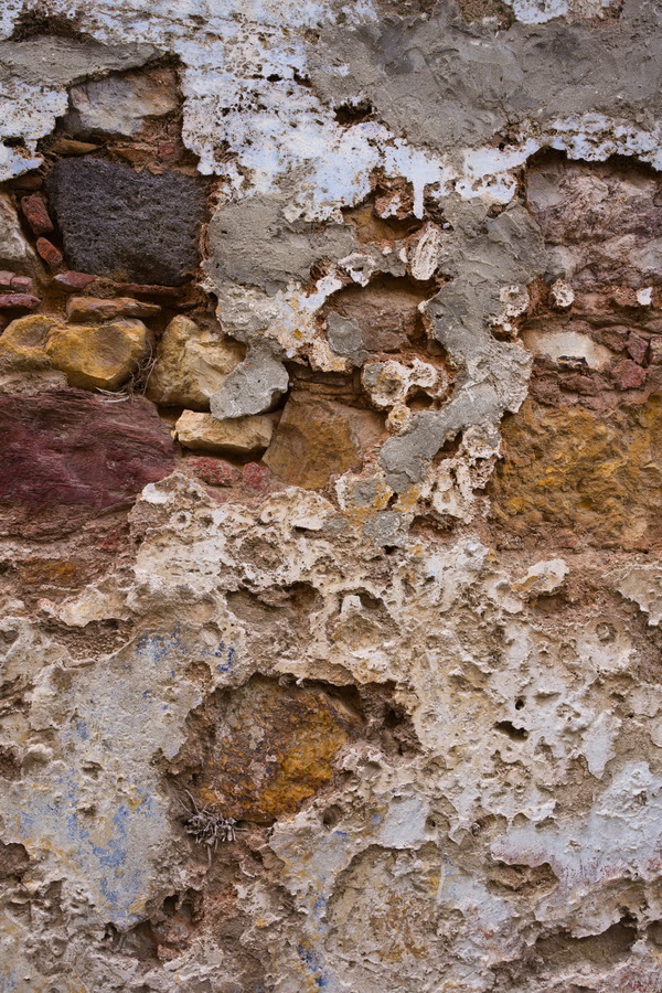 Photo 27444: Decayed, plastered wall in white, red and brown colours