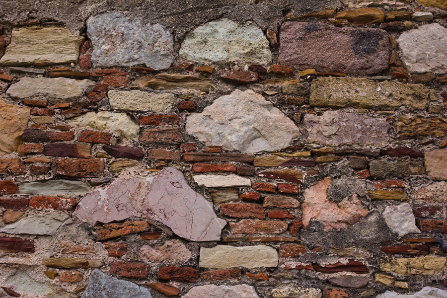 Photo 27446: Worn brick and stone wall in red and grey colours