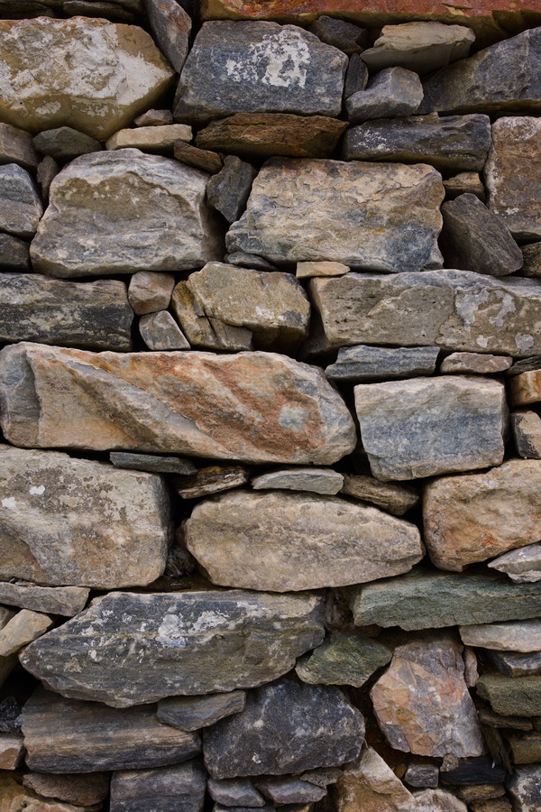 Photo 27450: Stone wall in grey, yellow and black colours