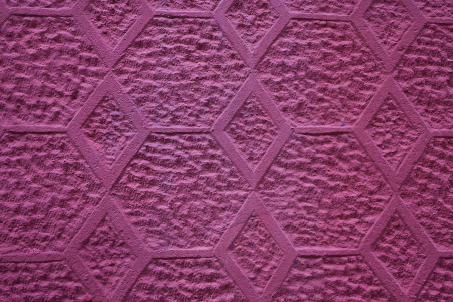 Photo 27463: Purple stone with carved pattern.