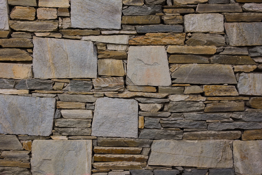 Photo 27465: Stone wall with grey and light yellow stones in various sizes