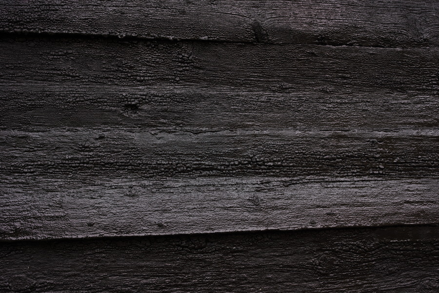 Photo 27495: Black, tarred board wall