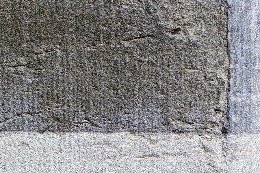 Photo 23886: Worn, grey, plastered wall with text 