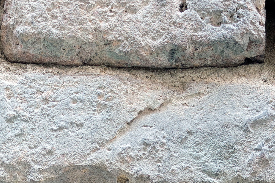 Photo 23933: Decayed brick wall with bricks in white, red and turquoise