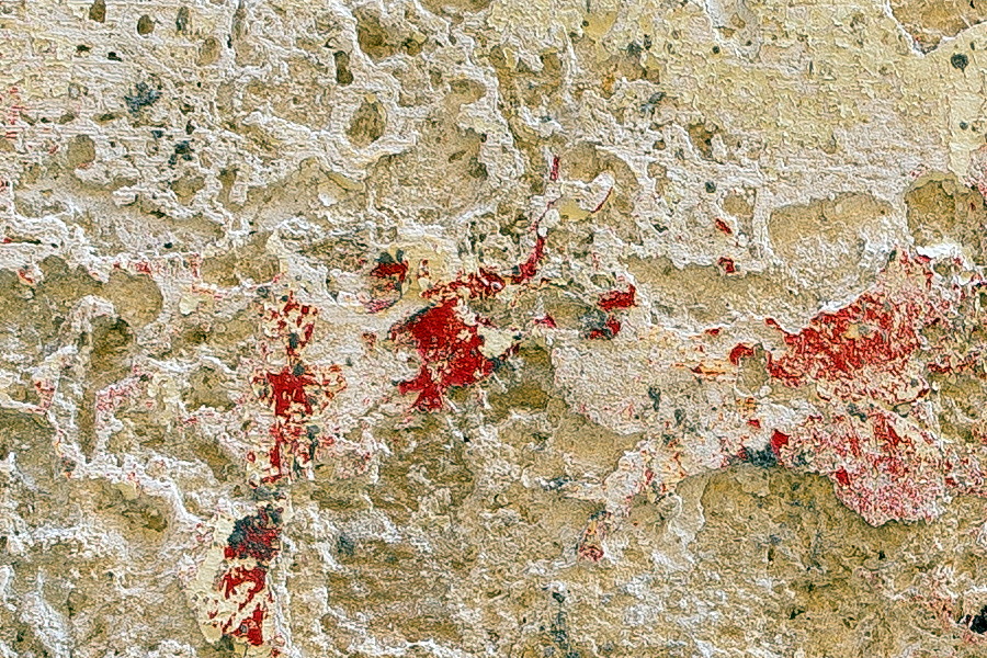 Photo 24195: Worn, yellow, plastered wall with grafitti