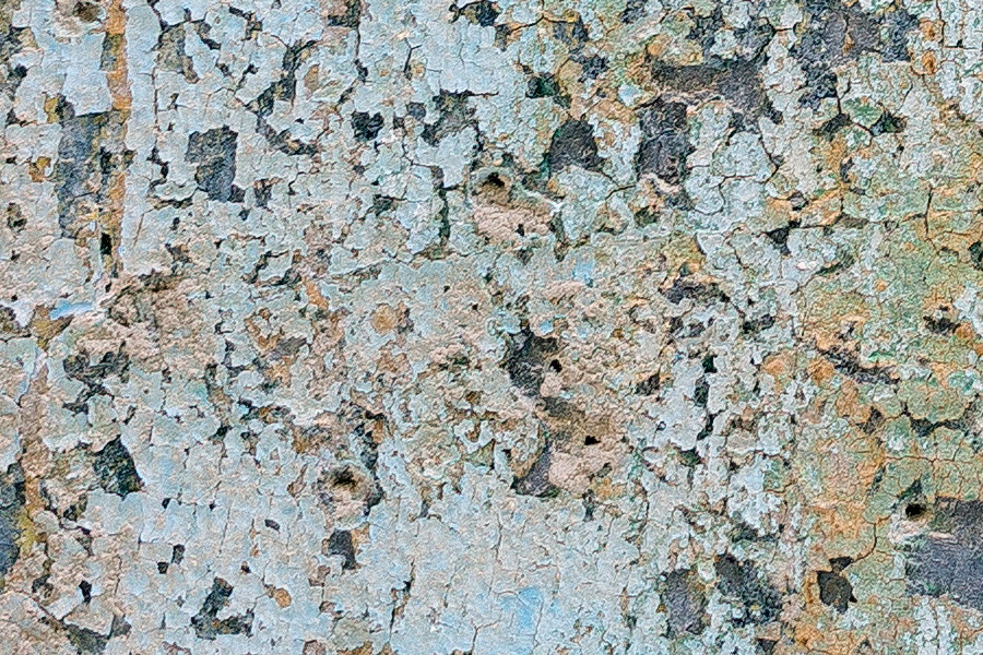 Photo 24314: Worn, plastered wall in yellow, white, light green and red