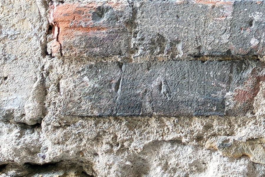 Photo 24612: Decayed wall with former window blocked by grey bricks