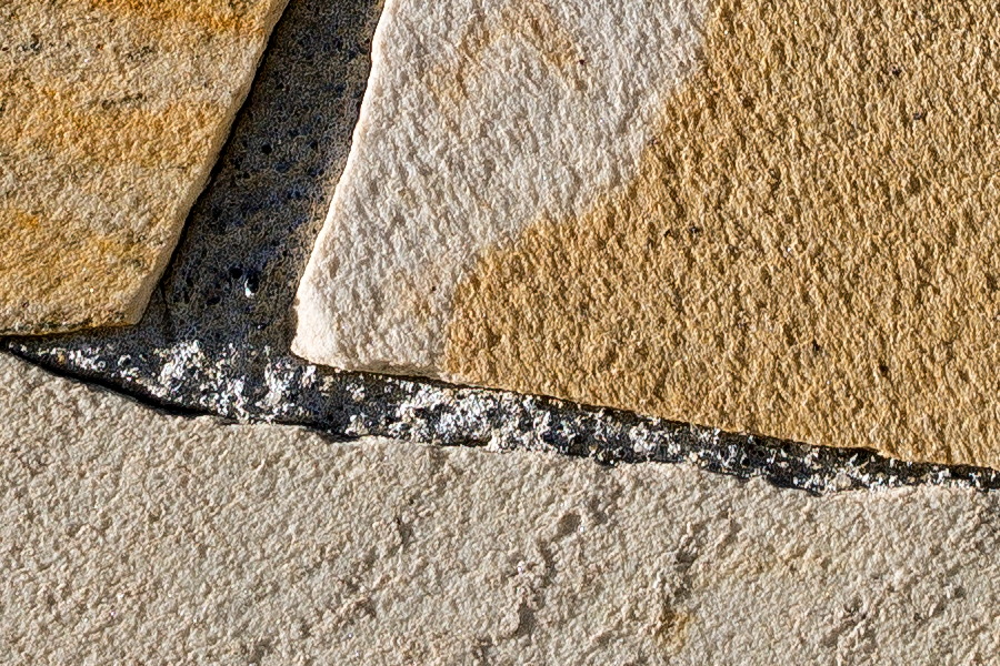 Photo 24723: Wall of irregular, light brown tiles
