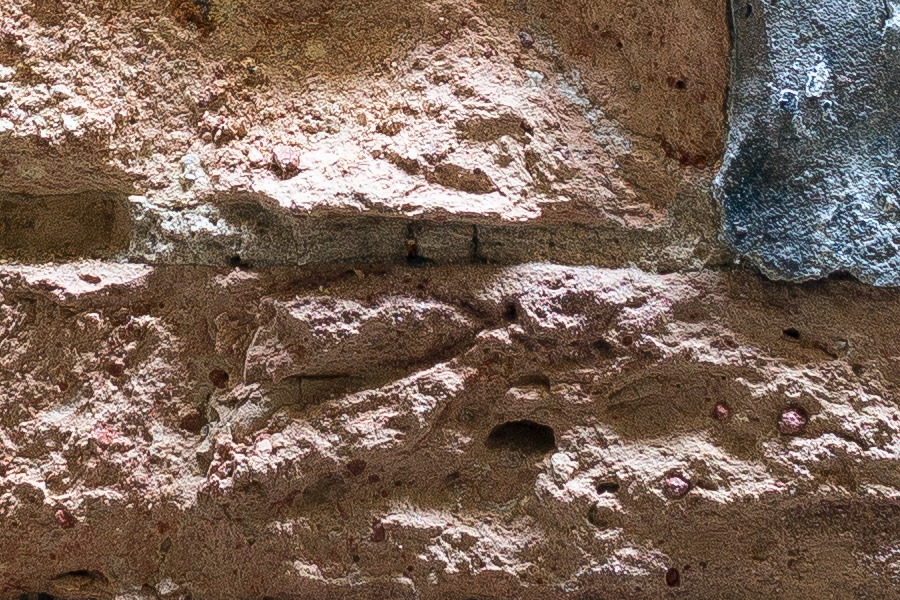 Photo 24769: Decayed, plastered brick wall in grey, yellow and red colours