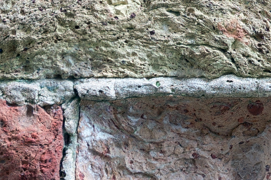 Photo 24789: Decayed brick wall in red, yellow and blue colours.