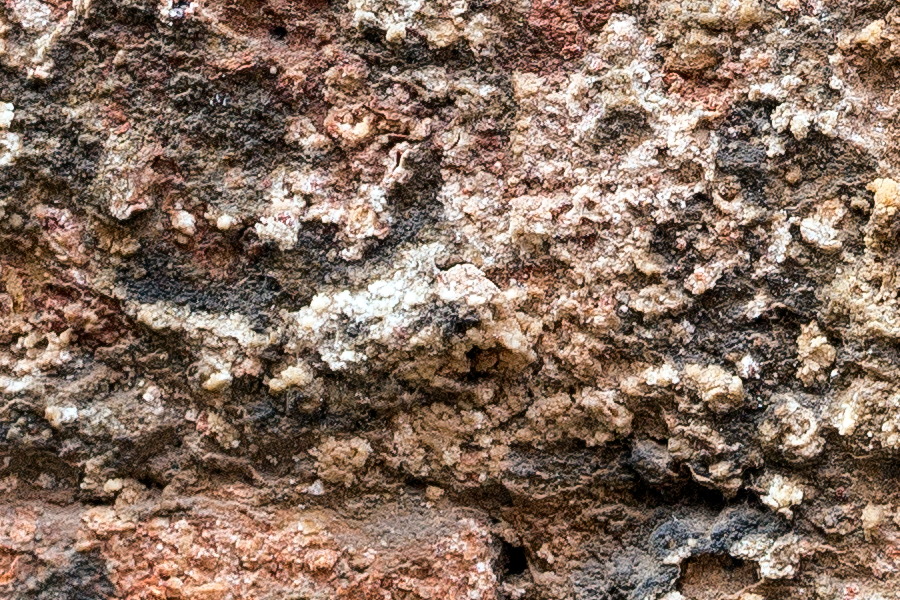 Photo 24805: Worn, plastered brick wall in red and yellow colours