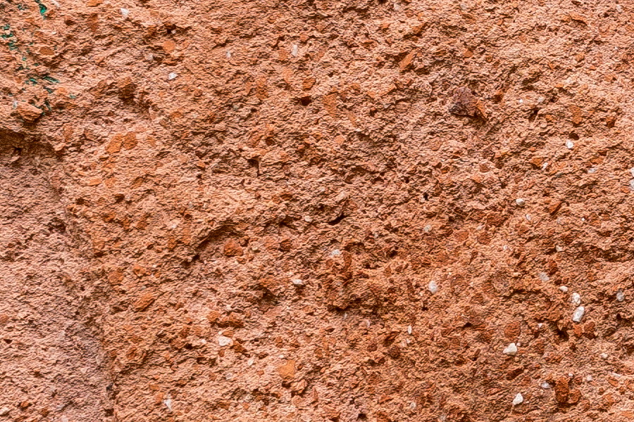 Photo 24810: Red plastered wall with uneven pattern