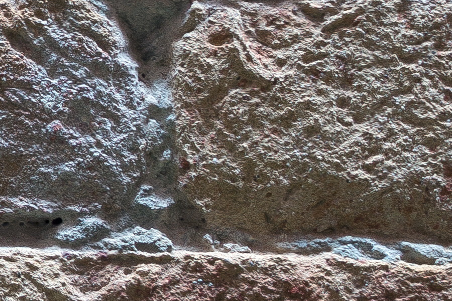 Photo 24817: Worn brick wall in white, red, blue and green