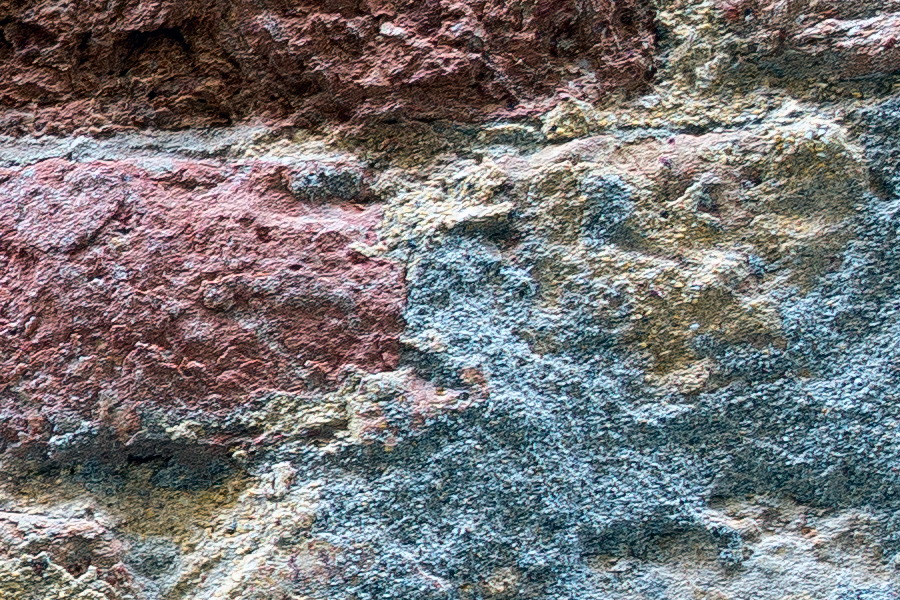 Photo 24832: Worn brick wall in yellow, red and blue colours