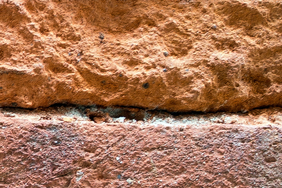 Photo 24850: Decayed, red and orange brick wall