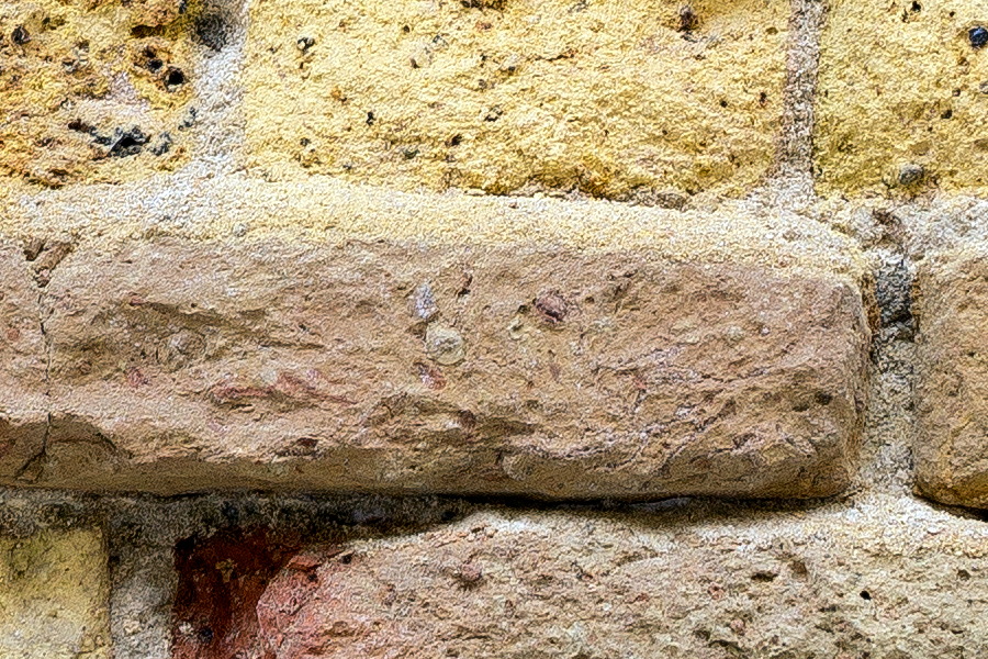 Photo 24859: Decayed brick wall in yellow and red colours