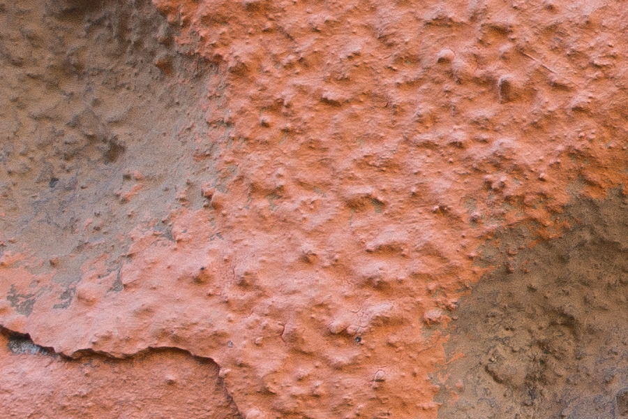 Photo 26086: Detail of orange, plastered wall