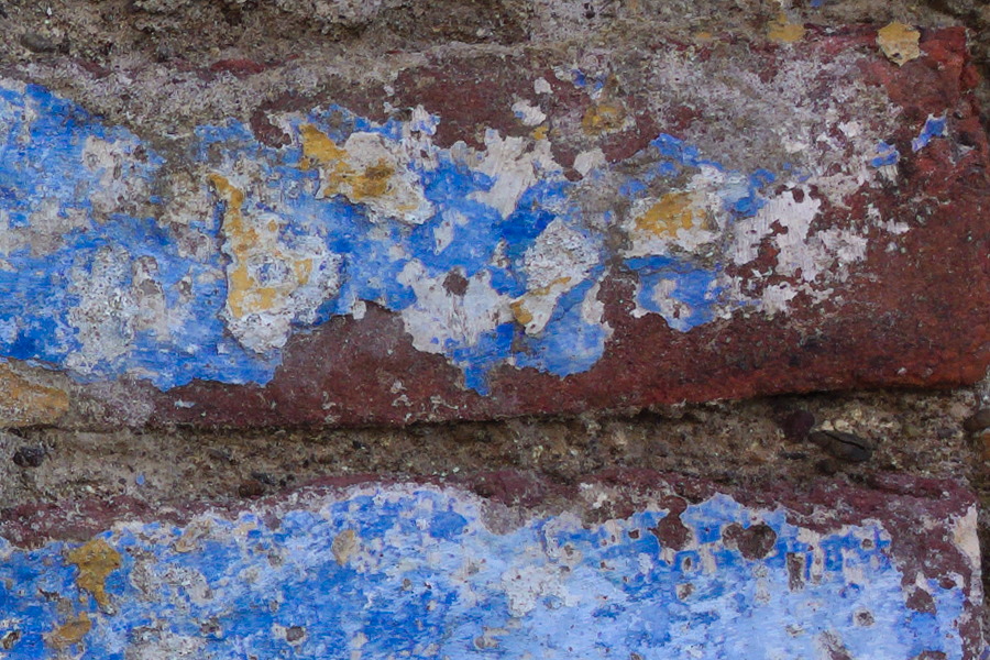 Photo 27417: Decayed, grey, plastered wall with bricks painted blue