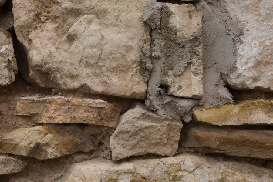 Photo 27432: Stone wall with yellow and grey stones of various sizes