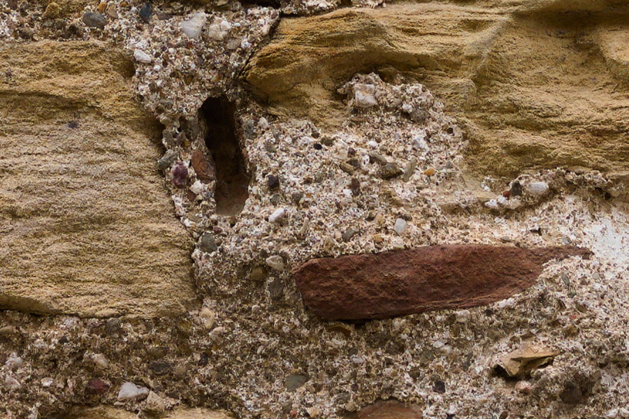 Photo 27434: Decayed brick wall in red, yellow and brown colours and remaining mortar