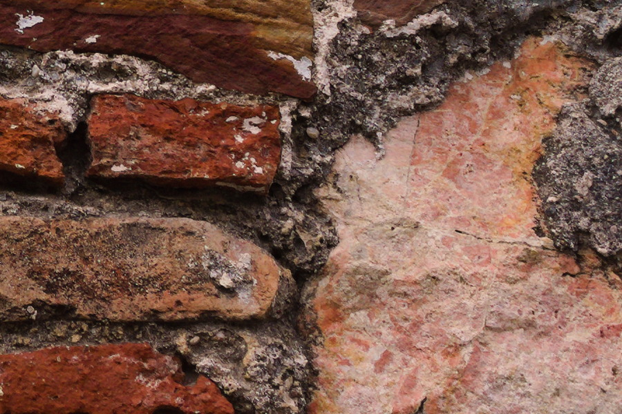 Photo 27446: Worn brick and stone wall in red and grey colours