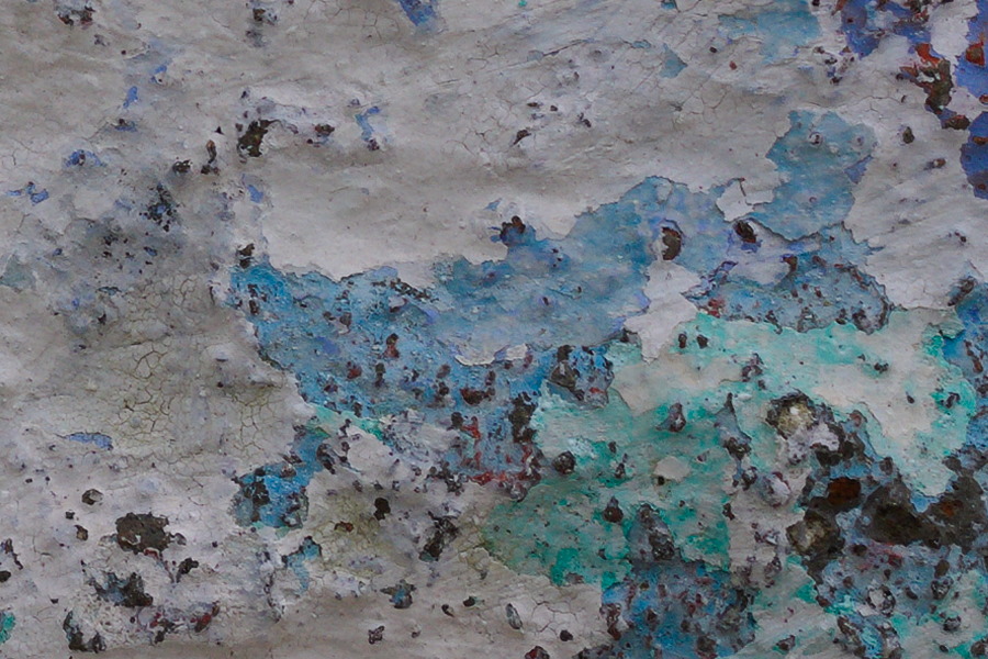 Photo 27452: Worn, white, plastered wall with red, purple, violet and turquoise colours