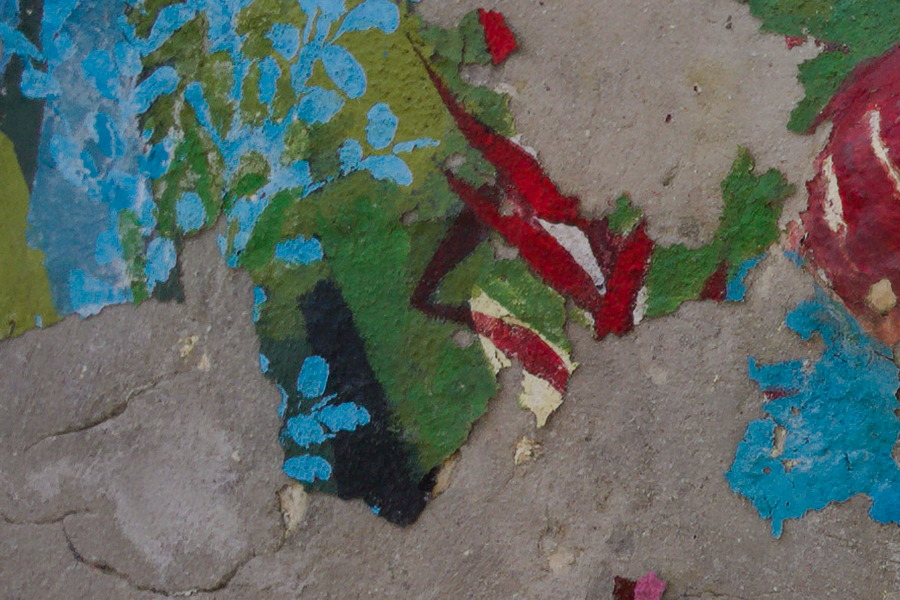 Photo 27506: Decayed, grey, plastered wall with remains of posters.